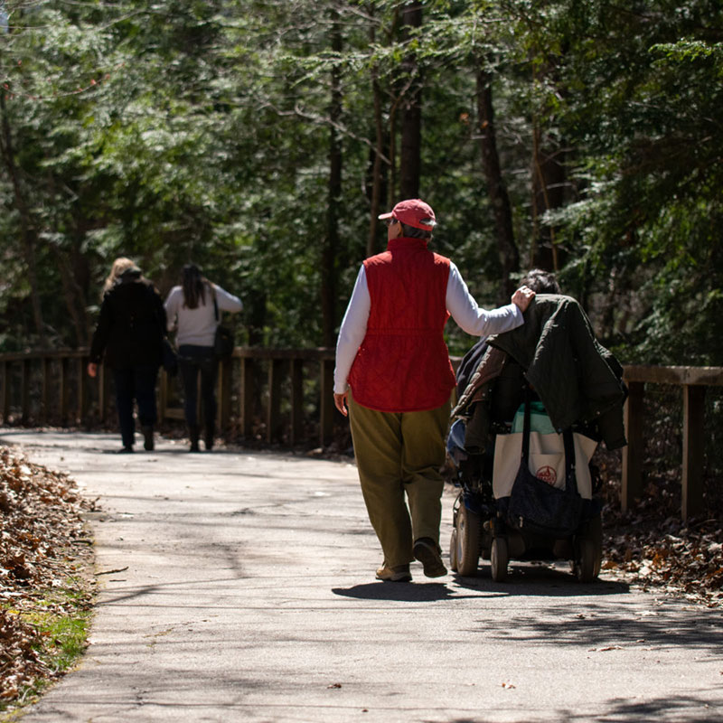 Nature Center visitor enjoying the accessible paths.