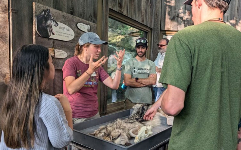Attendees learning at an educational event at the nature center