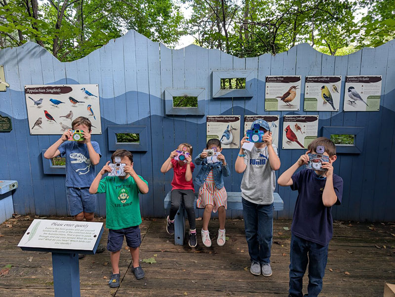 Kids club members with their cameras
